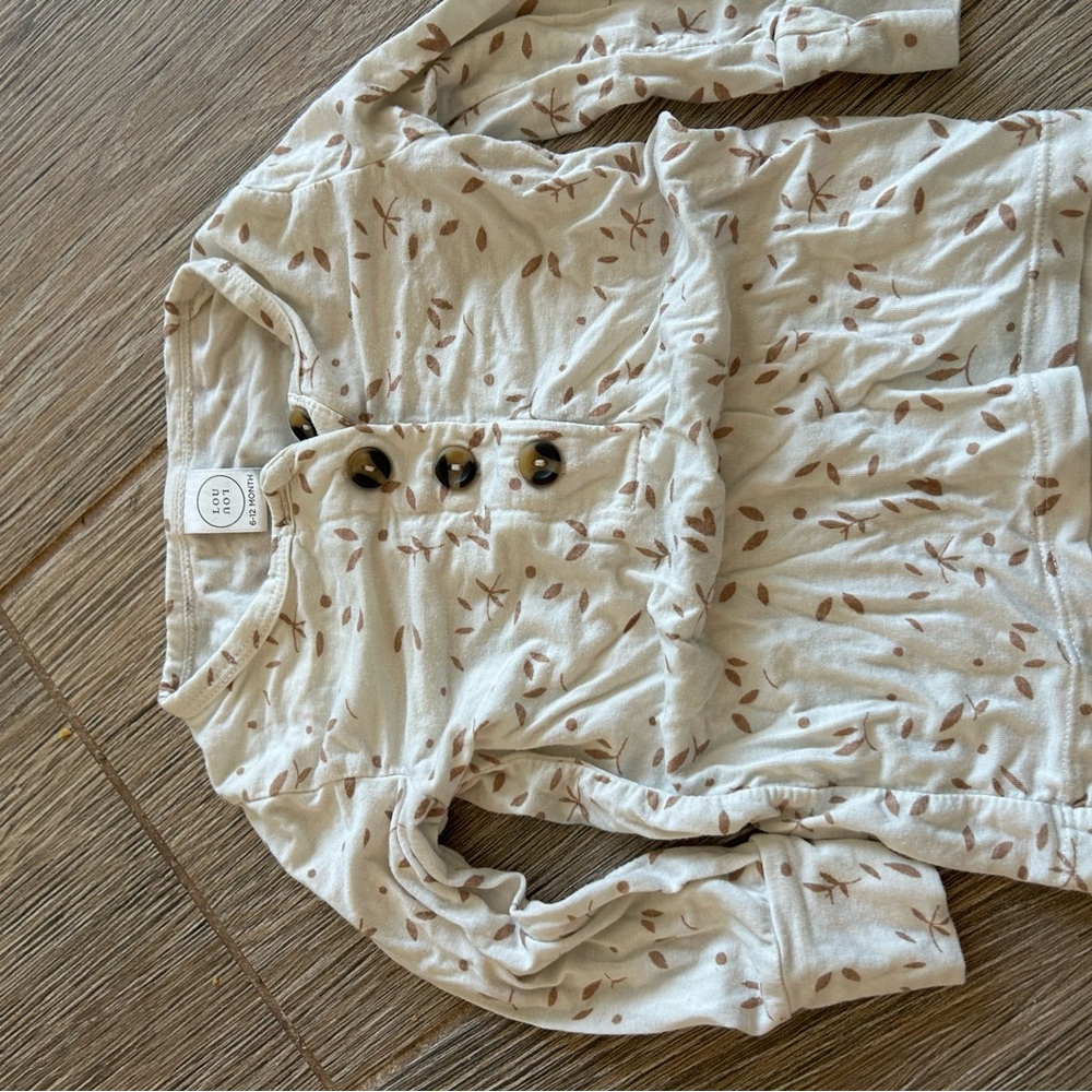 Lou Lou & Company Cream Long Sleeve Henley Tee with Brown Leaf Print